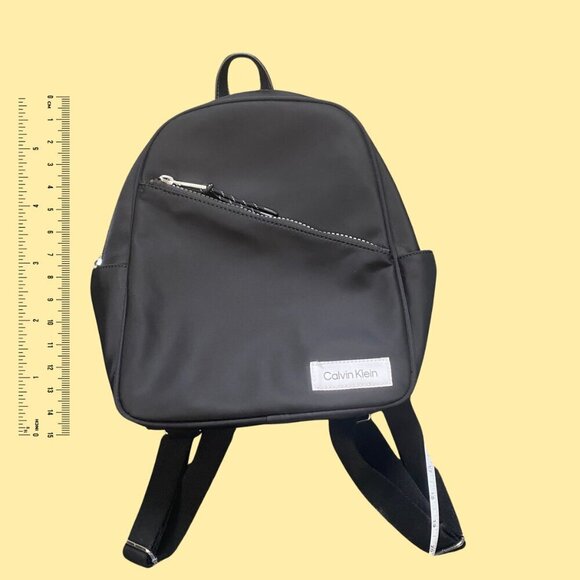 ✨ Calvin Klein Mini Backpack – Sleek Black Nylon with Silver Accents ✨ - Picture 6 of 7